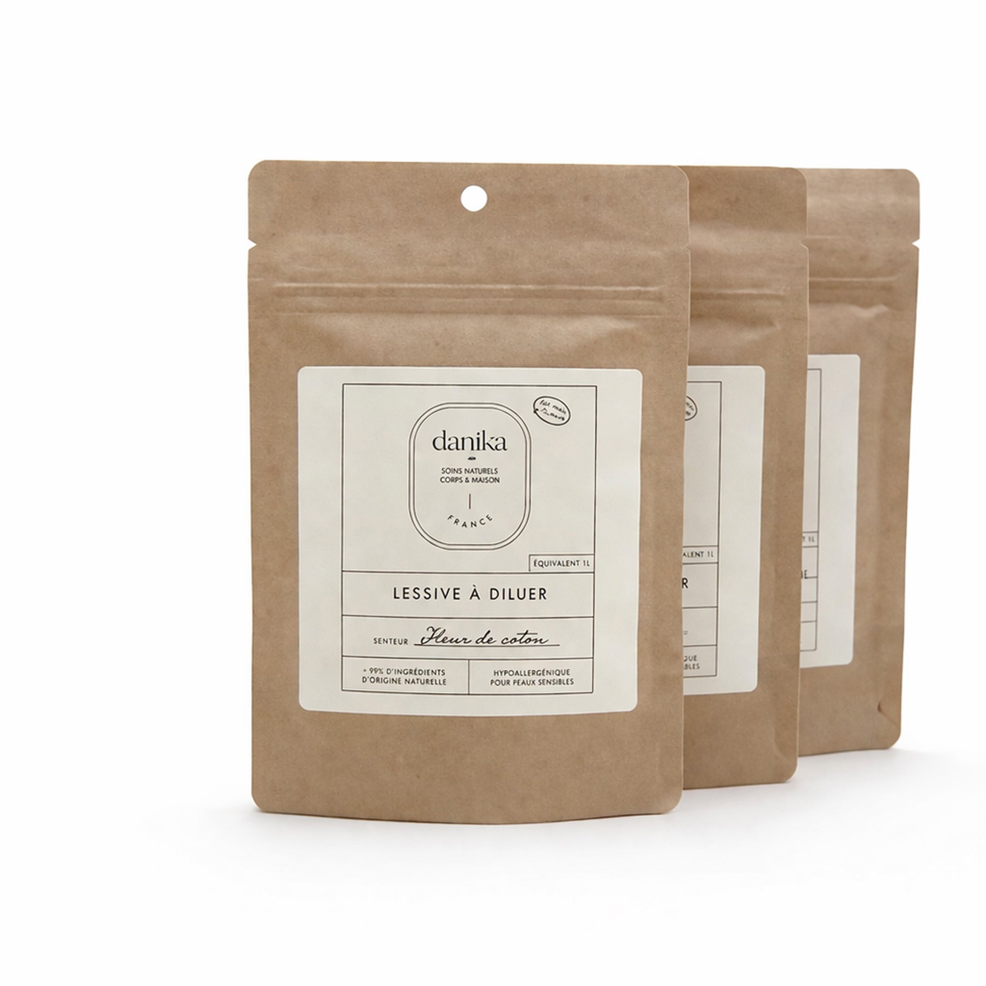 Trois recharges de lessive fleur de coton